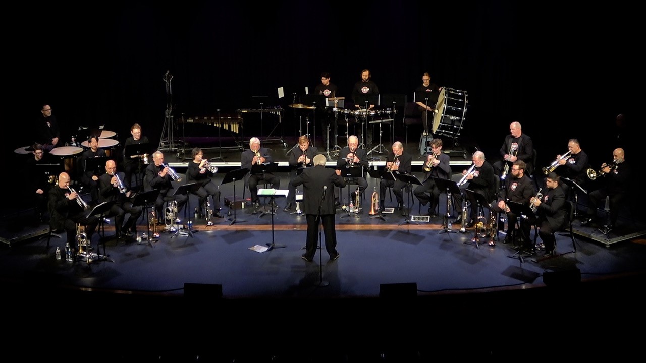 trumpet alliance performing in black